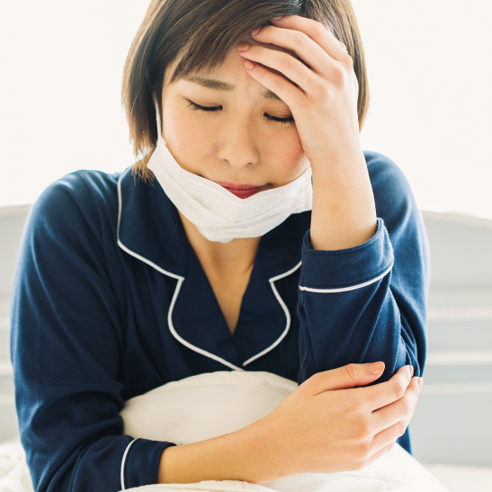 熱のある女性
